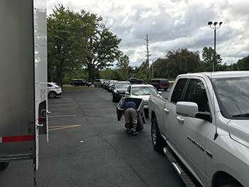 cars lined up for shredding, we helped over 100 visitors